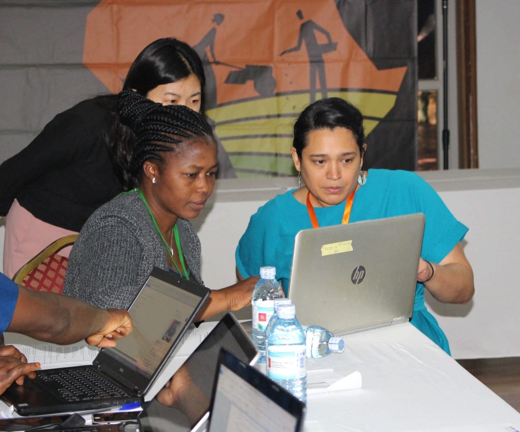  - Audrey Pereira (R) explaining to some of the participants